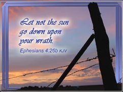 Sun Go Down - sun going down at fence with text from Ephesians photo