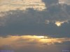 low contrast photo of sun behind clouds