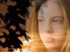 Full screen photo of young woman and fall leaves