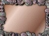 Brown stone border around a sand background, photorealistic