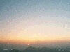 Sunset photo with mountain horizon at bottom border, light background, Moses ten commandments