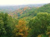 Photo of hills in fall with trees turning colors for use as a powerpoint graphic.