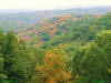 Photo of hills in fall with trees turning colors for use as a powerpoint graphic.