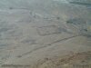 Aerial color photo of Roman siegeworks at Masada.