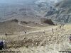 Color photo of view from Masada, showing the road up.