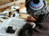 Color photo of a Jewish scribe copying scripture