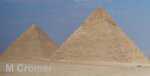 Color photo of teo Egyptian pyramids, in daylight.
