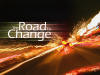 High tempo free powerpoint background jpg showing streaking car lights and the phrase Road to Change.