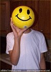 color photo fo man with smiley face over his head, pretend
