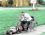 Color photo of man in wheelchair doing lawnwork for the church, dedication, excuses