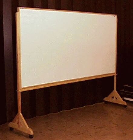 photo of free standing white board on casters, made by hand.